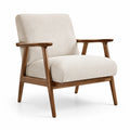 Poltrona in tessuto beige con struttura in legno